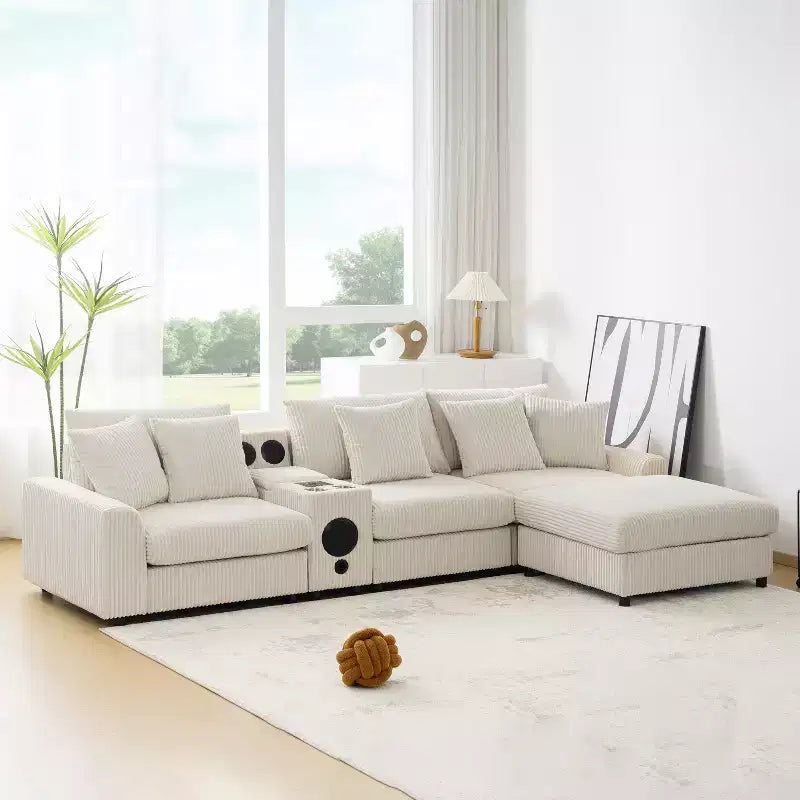 Canapé d'angle en velours côtelé de 290 cm avec haut-parleurs Bluetooth, chargeur USB, porte-gobelets et pouf - ModernLuxe