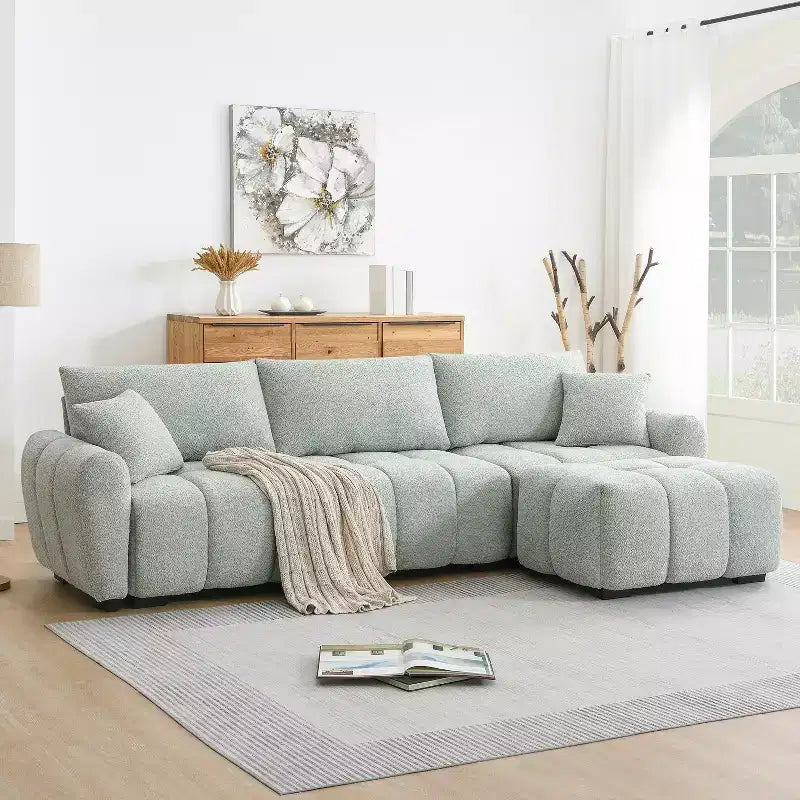 Canapé modulable en L de 110", avec assise extra-large, coussin à tirette, pouf et revêtement en tissu bouclé, 4 places